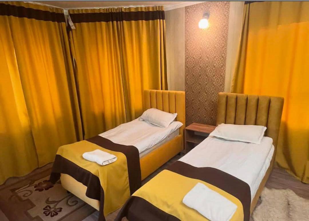 Turan Guesthouse 卡拉科尔 外观 照片
